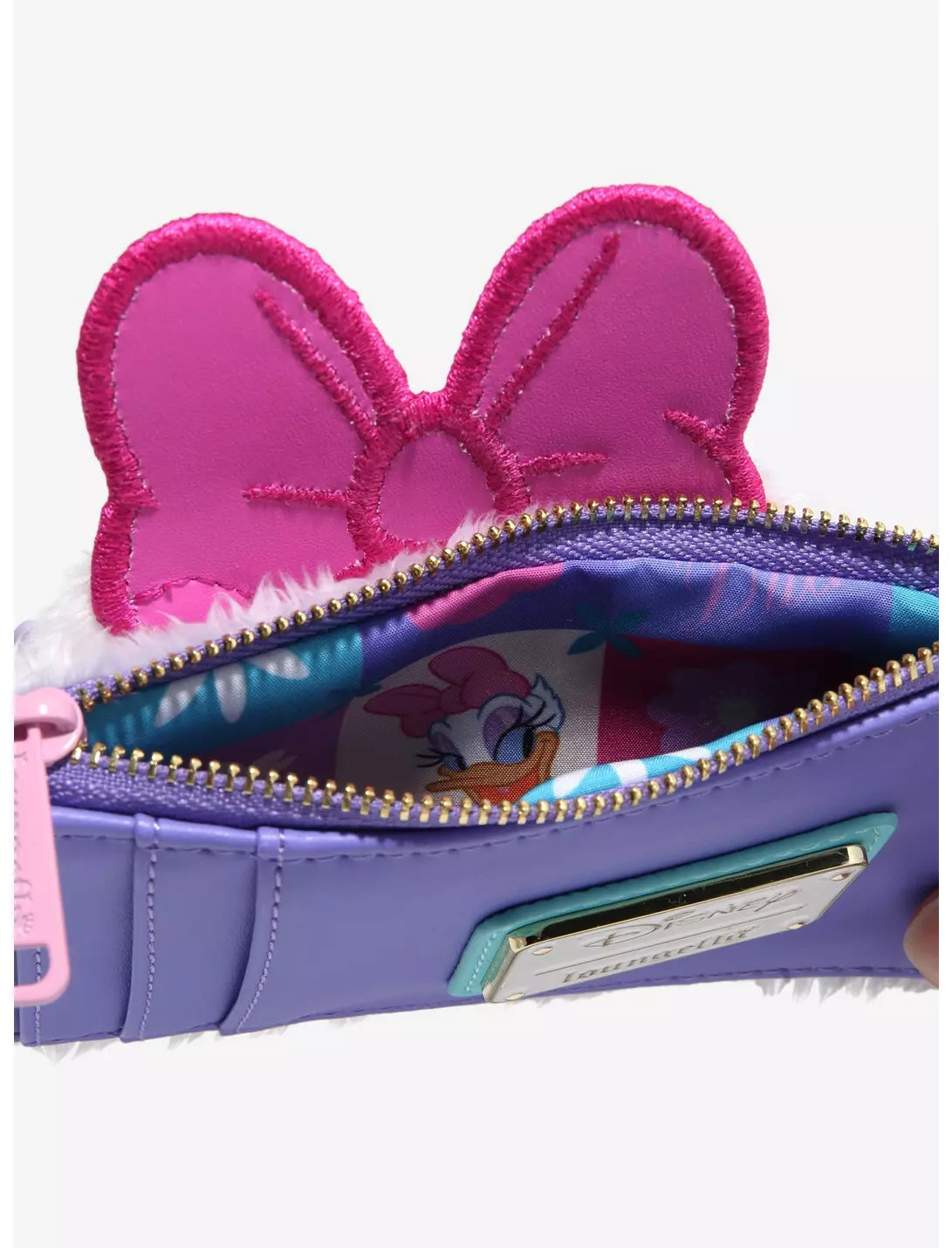 Purple coin pouch with pink ears and Daisy Duck design on a white background