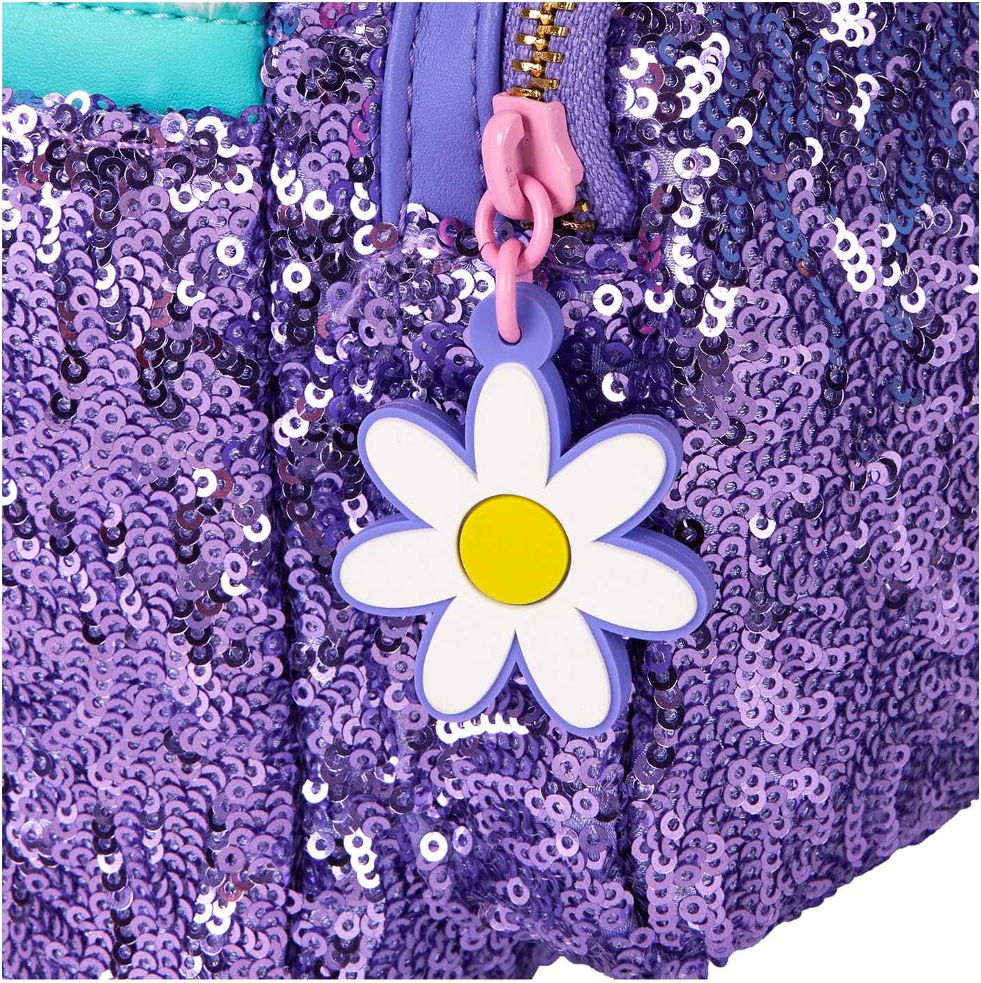 Close-up of a purple sequined bag with a daisy-shaped keychain.