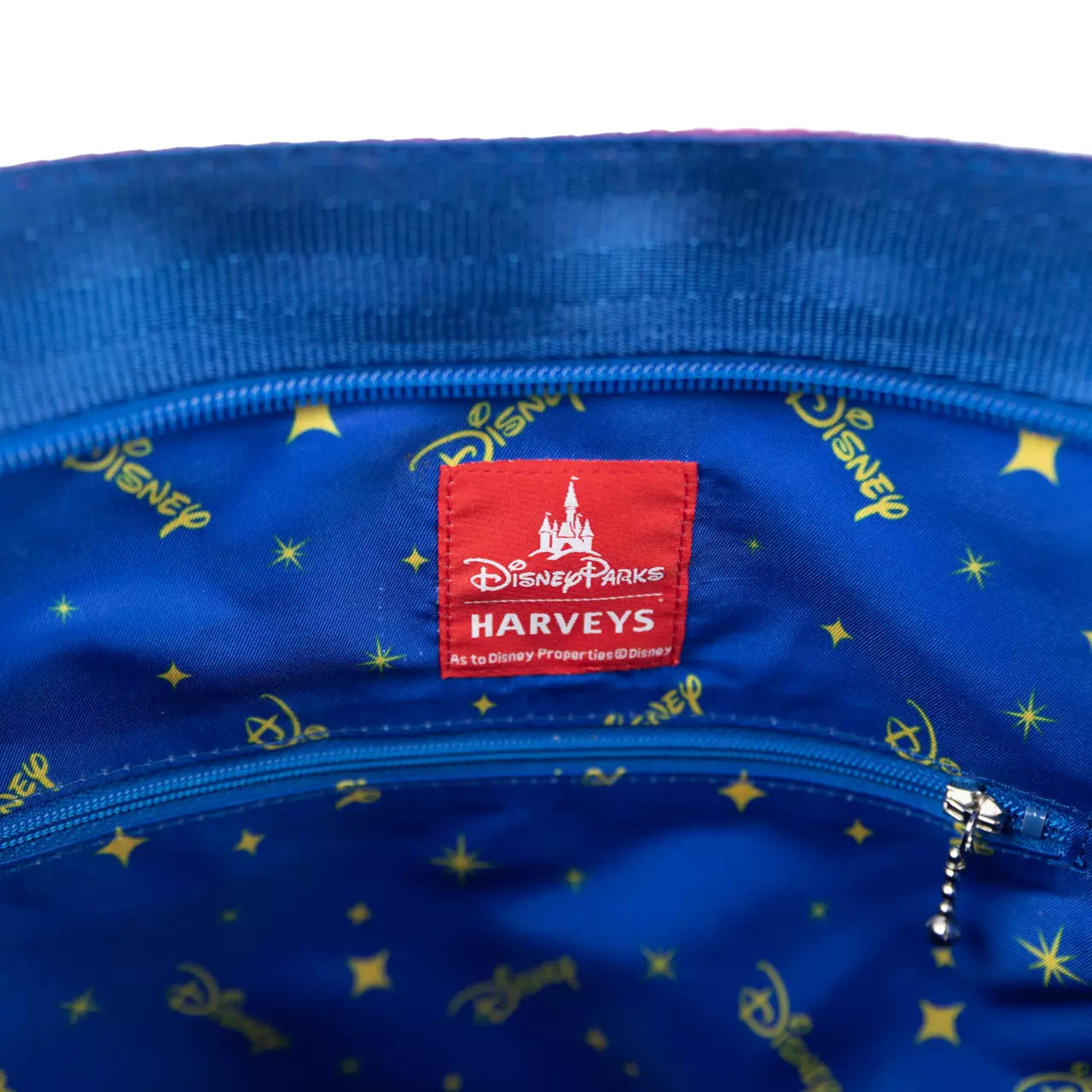 Close-up of the inside of the bag with a Disney Parks Harvey's label.