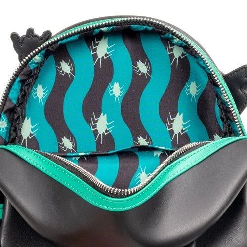 Close-up of a black backpack with teal interior lining featuring white insect patterns.