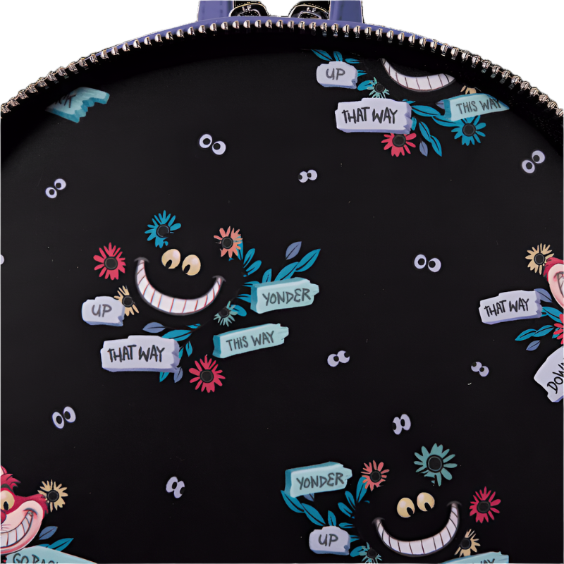 Inside view of the mini backpack with colorful Alice in Wonderland-themed designs and Text 'That Way', 'Up', This Way', and 'Yonder' on a white background