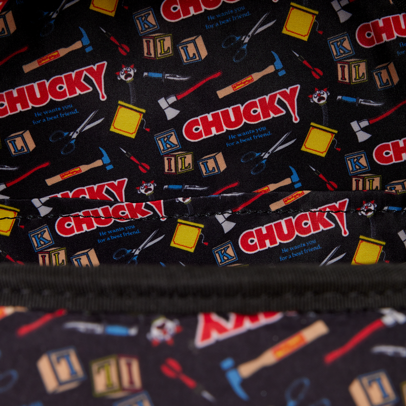 Patterned fabric with 'Chucky' text and tools on a black background