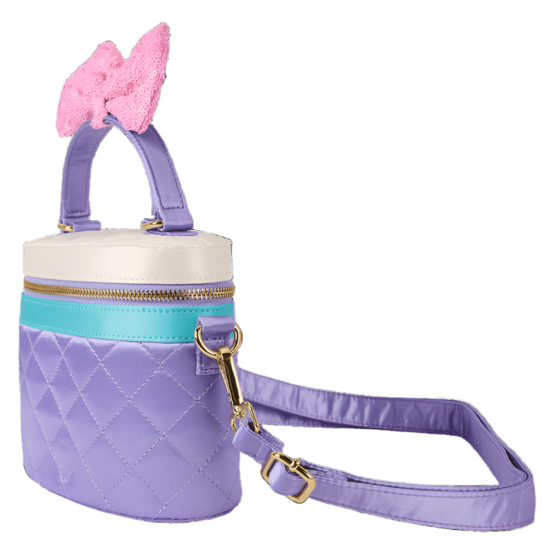 Purple quilted bag with pink sequin bow on a white background