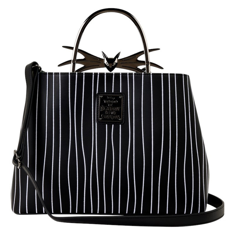 Black and white striped handbag with a Jack Skellington bat design on a white background