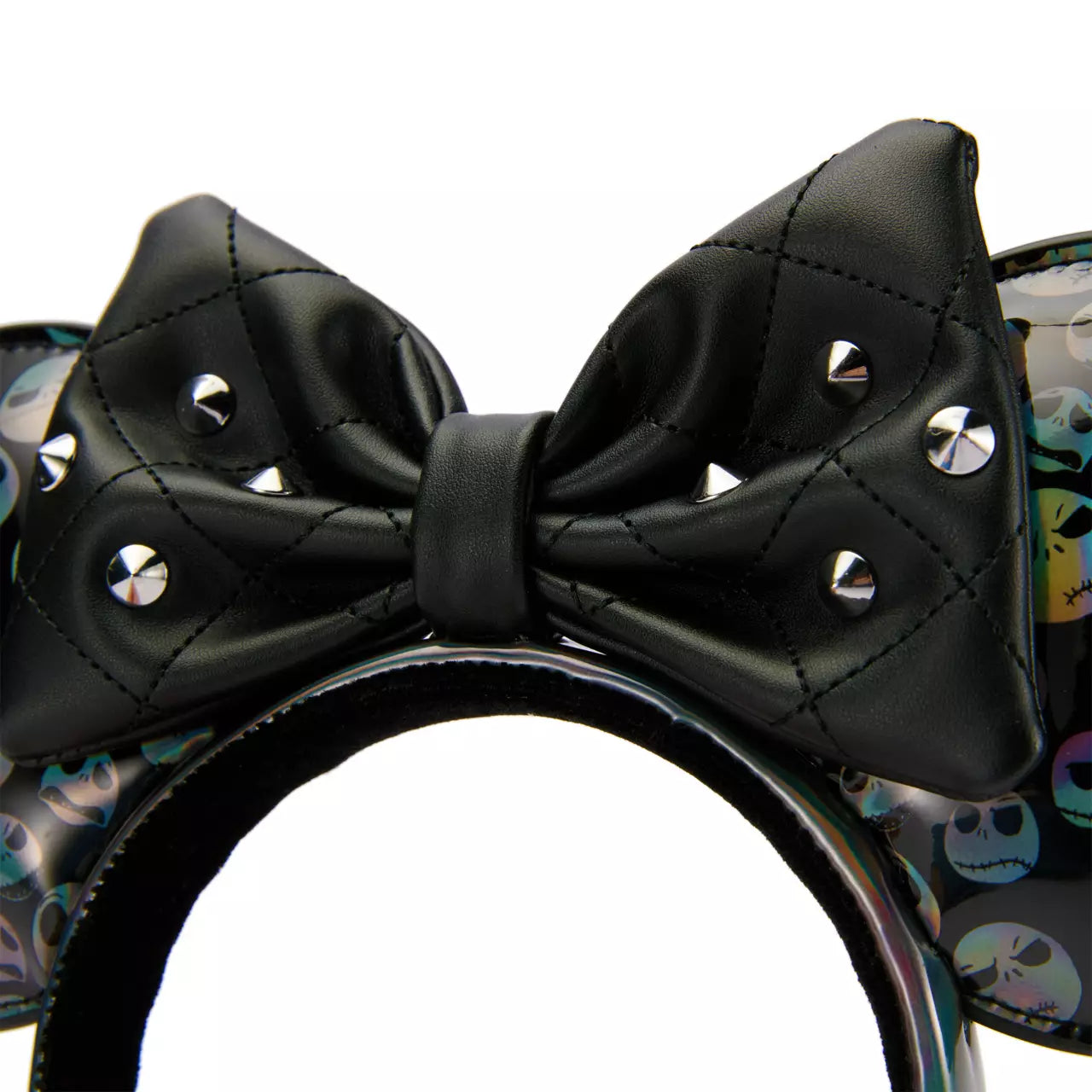 Black bow with studs on a headband with colorful skull design