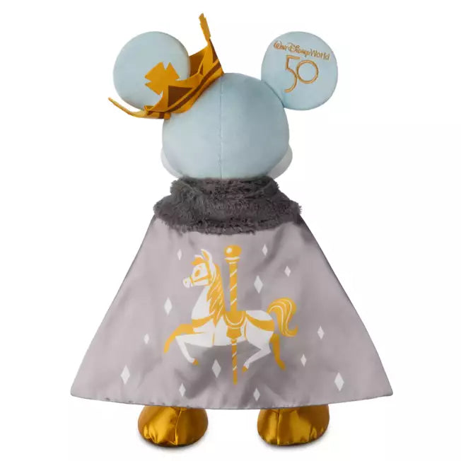 Mickey Mouse plush with decorative hat and cape on a white background