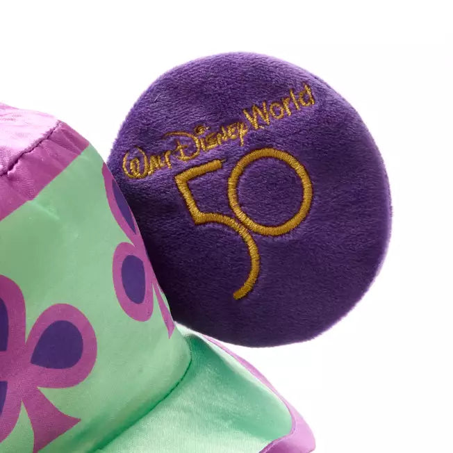 Purple plush item with 'Walt Disney World 50' embroidery on a white background
