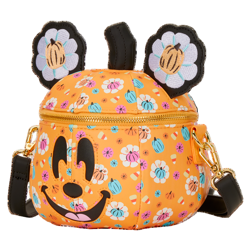 Floral and pumpkin-patterned bag with Minnie Mouse face and flower Minnie ear design on a white background