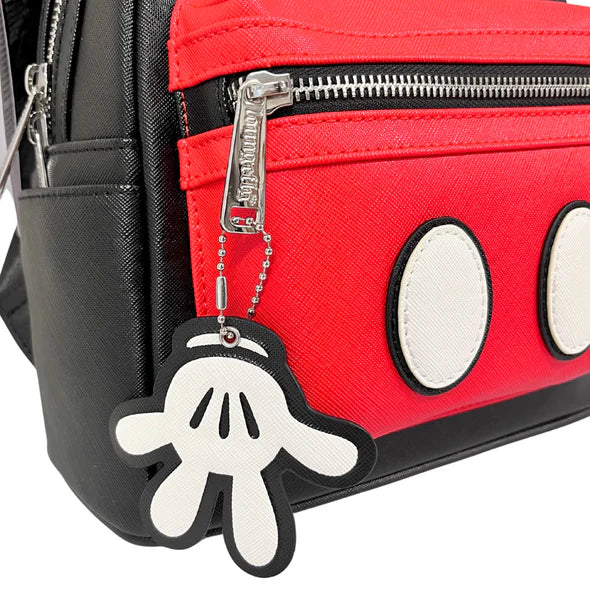Red and black bag with a Mickey Mouse keychain attached