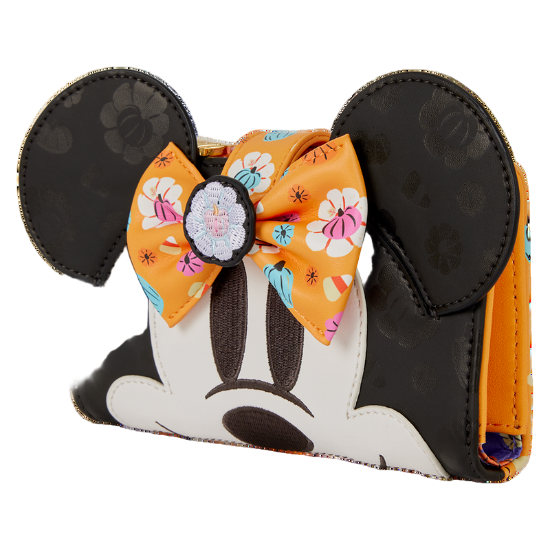 Minnie Mouse Halloween wallet with a large orange bow and Minnie Mouse ears on a white background