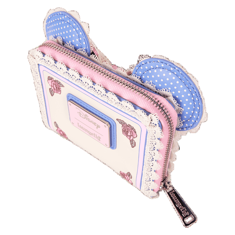 Pastel-colored wallet with decorative floral elements on a white background