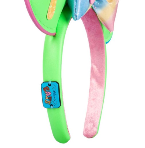 Colorful headband with a green base and pink with "Disney Eats" on a white background