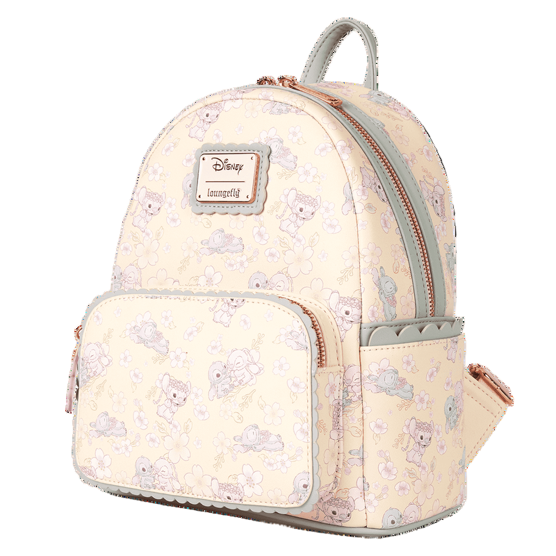 Side view of Stitch & Angel Cherry Blossom Backpack with Stitch & Angel pattern on a white background