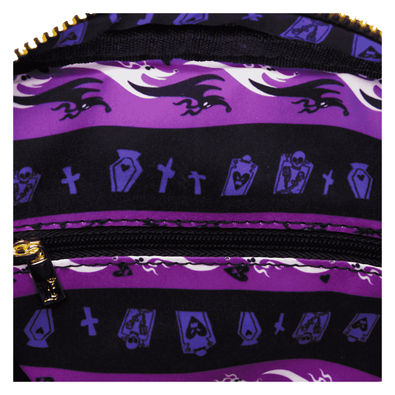 Purple and black patterned bag with gold zippers