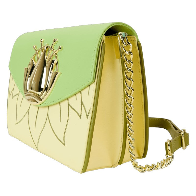 Handbag with green top section and yellow base, featuring a gold chain strap on a white background.