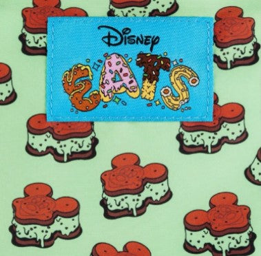 Disney Mickey Mouse mint ice cream sandwich on a patterned background
