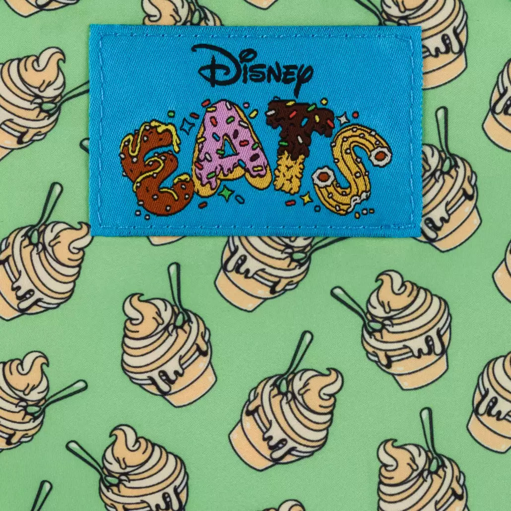 Disney Eats patch on a green background with ice cream pattern