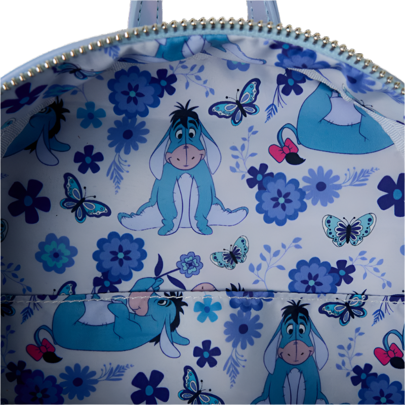 Inside of floral-patterned bag with eeyore and butterflies