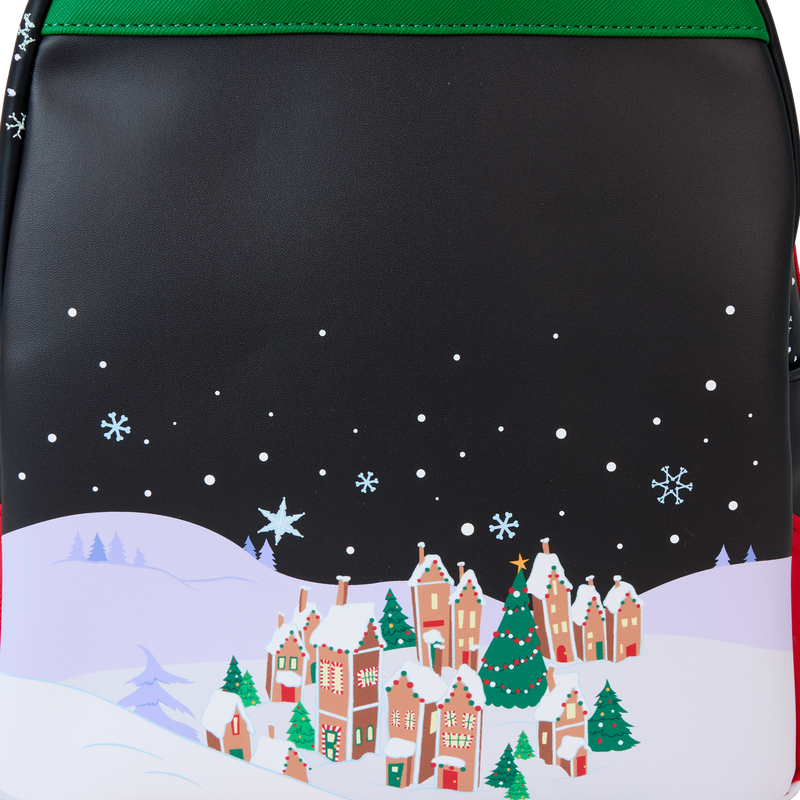 Back of NBC Town Carousel backpack with a winter scene design featuring houses, trees, and snowflakes on a dark background.