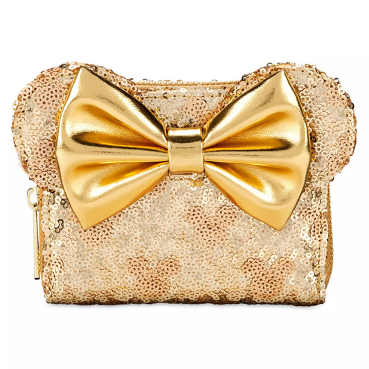 Gold sequin wallet with a large bow on a white background