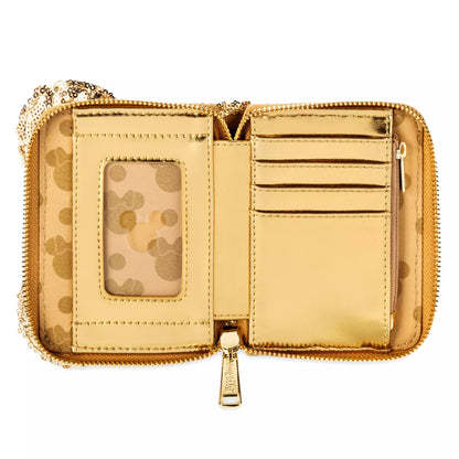 Gold wallet with a zipper on a white background
