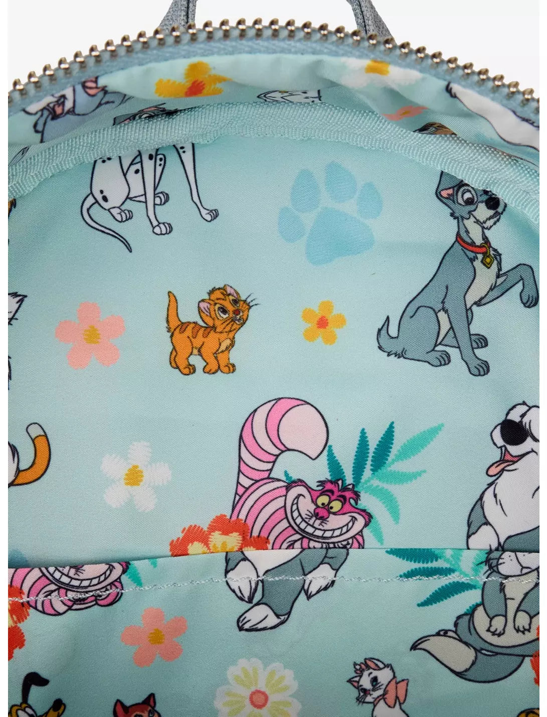 Backpack with Disney cats and dogs design on a light blue background