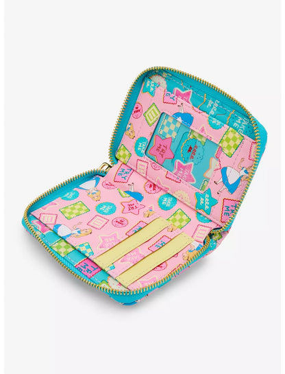 Inside of wallet with Alice and Alice in Wonderland designs on a white background