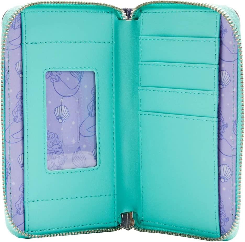 Open teal and purple wallet with shell pattern