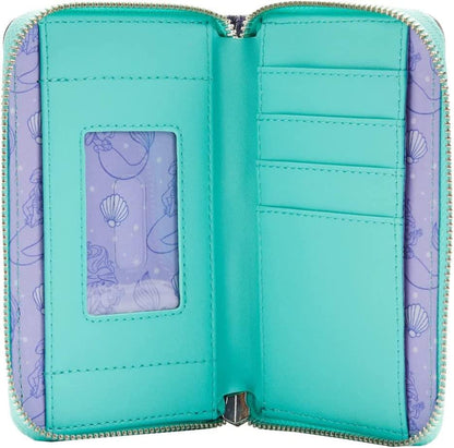 Open teal and purple wallet with shell pattern