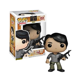 Funko Pop! vinyl figure of Prison Glenn Rhee from 'The Walking Dead' next to its packaging holding his rifle on white background