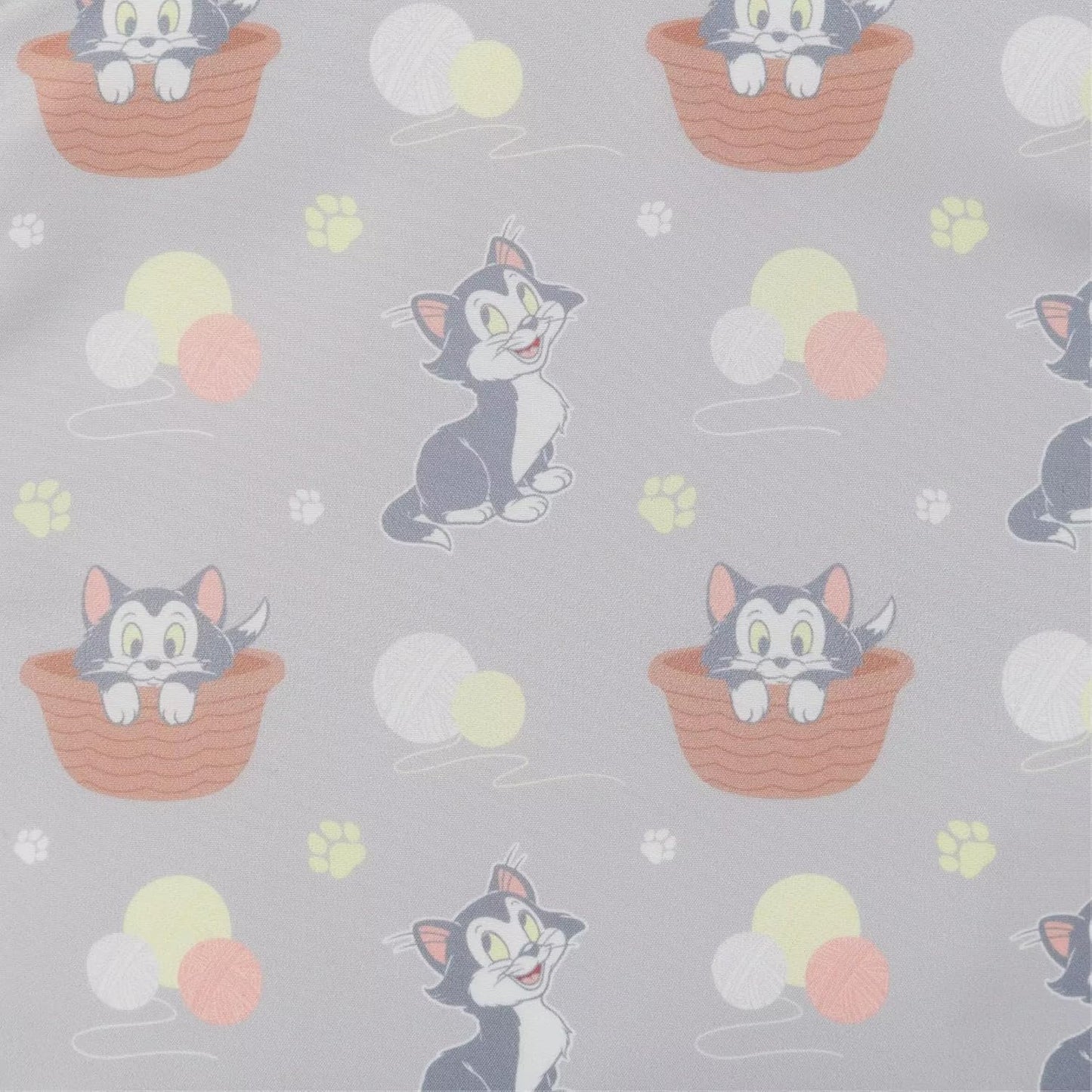 Pattern of Figaro and yarn balls on a gray background