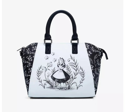 Handbag with Alice in Wonderland design on a white background