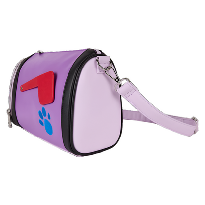 Side view of purple Blue's Clue Mail Box Crossbody Bag with red flag and blue paw print design on a white background