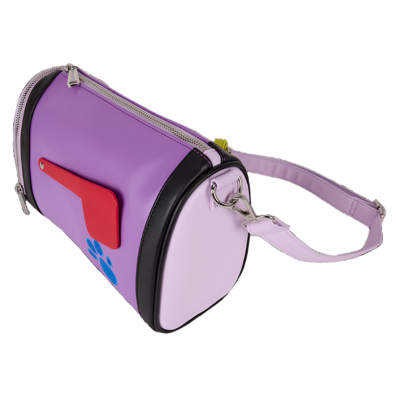 Side view of purple Blue's Clue Mail Box Crossbody Bag with red flag and blue paw print design on a white background
