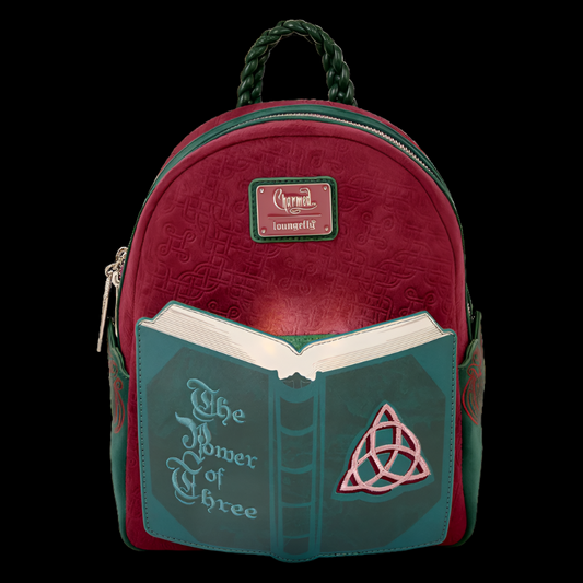 Red and green backpack with book design and 'The Power of Three' text on a white background