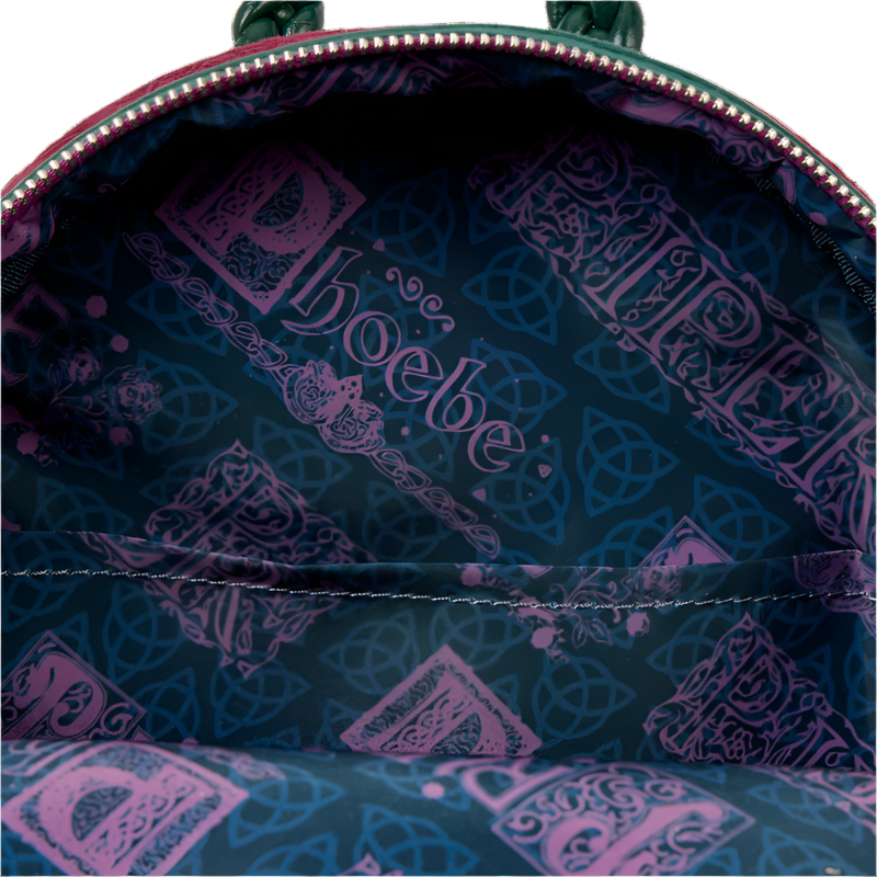 Close-up of a backpack interior with a patterned design and character's names.