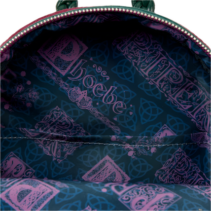 Close-up of a backpack interior with a patterned design and character's names.