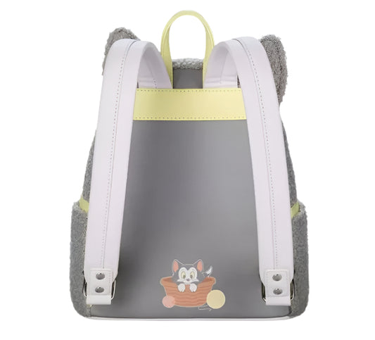 Backpack with cartoon design on a gray background