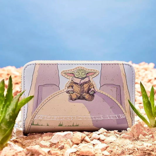 Wallet with Grogu sitting on a rocks, surrounded by plants