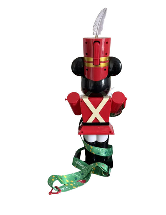 Mickey Mouse toy soldier sipper with red helmet and green ribbon on a white background
