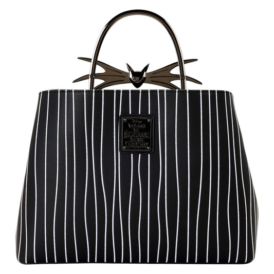Black and white striped handbag with a Jack Skellington bat design on the handle against a white background