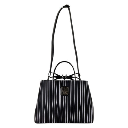 Black and white striped handbag with a Jack Skellington bow detail on a white background