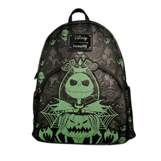 Backpack with green and black design featuring a pumpkin character on a white background