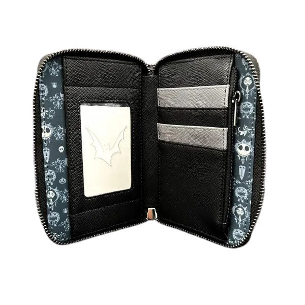Open wallet with decorative strap and card slots on a white background