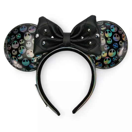 Black Minnie Mouse ears with a bow and Jack Skellington pattern on a white background
