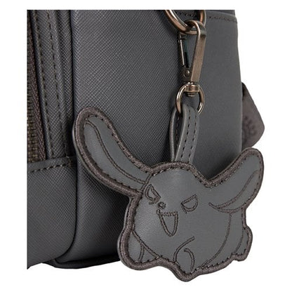 Gray dog-shaped (Wanmi Kuromi's dog) keychain attached to a gray backpack