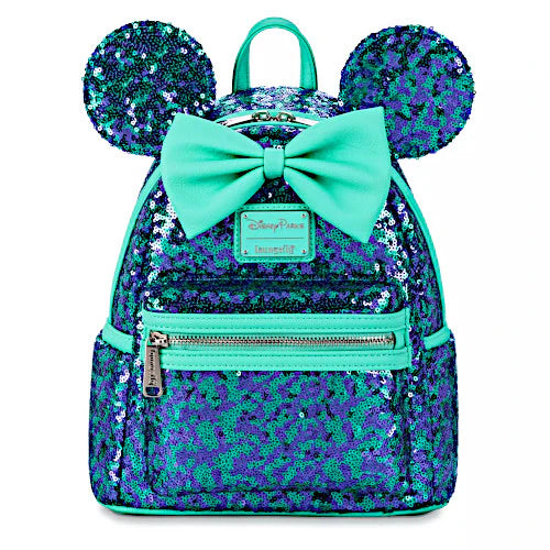 Backpack with sequin design, ears, and a bow on a white background