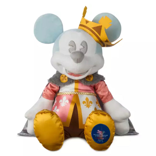 Mickey Mouse resembling a royal character with a crown and decorative outfit on a white background