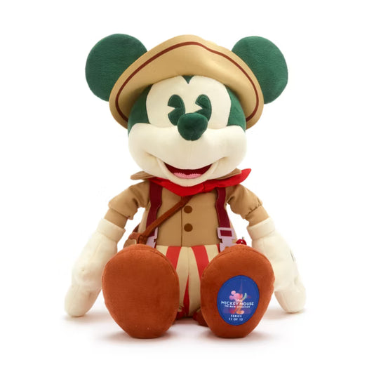 Mickey Mouse in a safari outfit with a hat on a white background