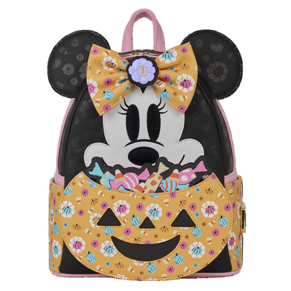 Backpack with Minnie Mouse design featuring a bow and candy-themed pattern on a white background